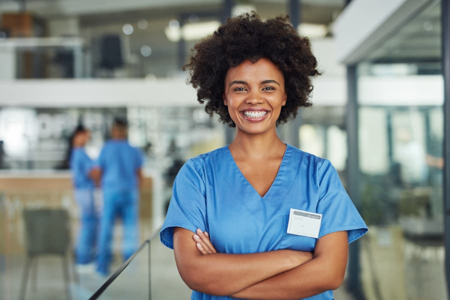 Nurse Smiling In Scrubs